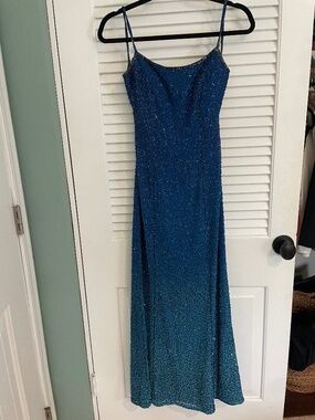 Blue beaded full length evening gown